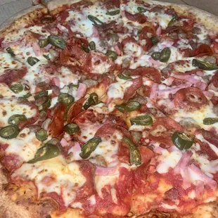 Medium Original Crust Pepperoni, Canadian Bacon, Sausage, and Jalapeno Peppers Pizza
