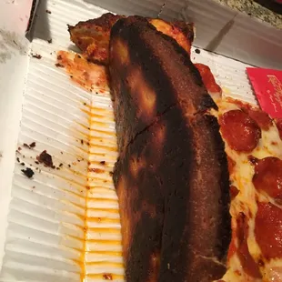 completely burnt on the bottom and crust