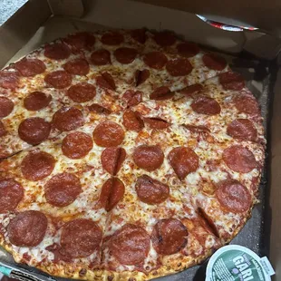 Broken dipping sauce soaked cardboard box.