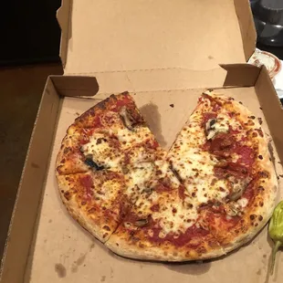 My "medium" pizza that wasn't even the size of a small.