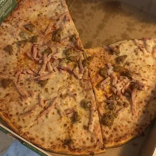 Supposed to be an extra sausage, Canadian bacon, and onion.