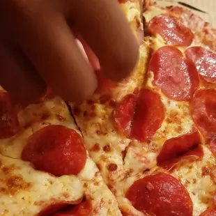 The can't seem to cut a pizza right all the way through