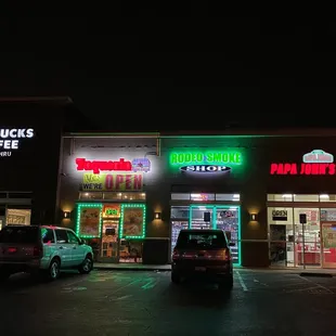 the outside of a restaurant at night