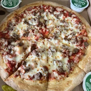 Apparently this is what $4 dollars for extra cheese gets you and the manager refused to do anything about it. Never ordering here again