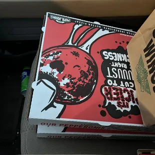 Pizza that I put in the passenger seat.