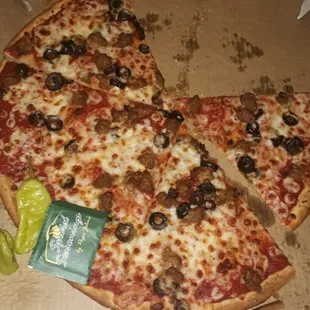 Thin crust spicy sausage and olives