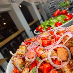 Family style panzanella salad and garden salads