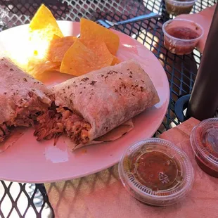 Carnitas Burrito Mucho rice beans $9.75 free chip! mixed salsa + green mild.  China plate real silverware, in/out seats, next to gas stn!