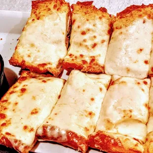 four slices of pizza on a plate