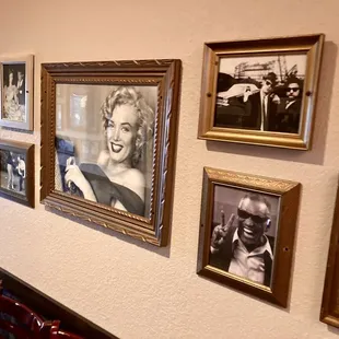 a wall full of old photos