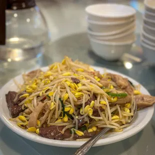 Stir fried pork intestine with bean sprouts