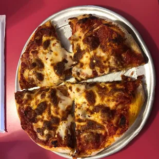 A great pizza. Full of toppings. Chewy crust. Perfect. They are back open for lunch. A great experience