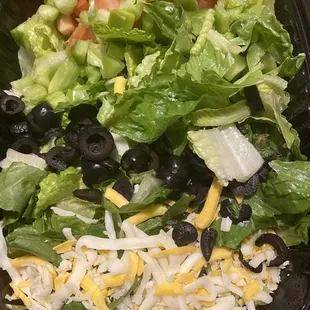 a salad in a plastic container