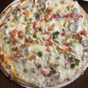 a pizza on a wooden table