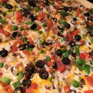 a pizza with various toppings