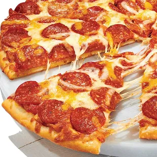 a pepperoni pizza cut into slices