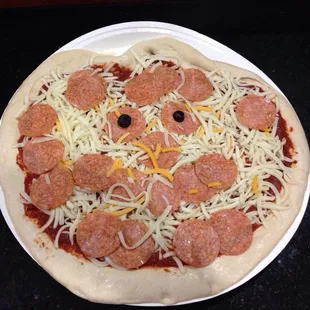 Halloween Jack o lantern pizza. $8