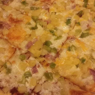 Pineapple, onion and green pepper on a thin crust.