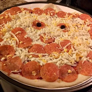 Halloween Jack-o-lantern pizza ($8)