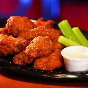 Buffalo wings , we won&apos;t tell how we make them!! Try them then you would know. lots of different flavors available