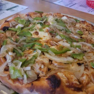 Bbq chicken pizza with peppers and onions added