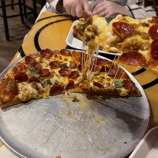 pizza being served
