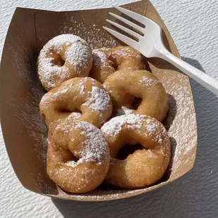 French toast donuts.  This was serve with maple syrup and powdered sugar. Really good.