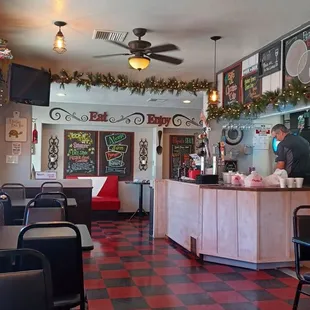 a restaurant with a checkered floor