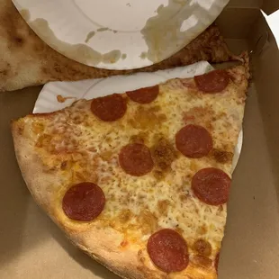 Slice of pepperoni pizza