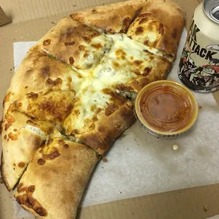 Fenway calzone withe sausage and sauté mushrooms peppers and onions