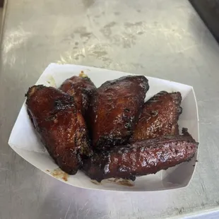 Smoked Chicken Wings in House Made Cranberry BBQ Sauce