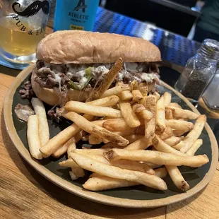 Philly Cheesesteak with fries &amp; an Athletic Brewing Run Wild IPA N/A beer  ~ delish!