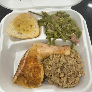 Baked Chicken plate, dirty rice, green beans and toast