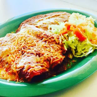 Enchiladas Rojas!  Our red enchilada sauce is REAL!!!Sun dried Anaheim pepper sauce with your choice of filling.
