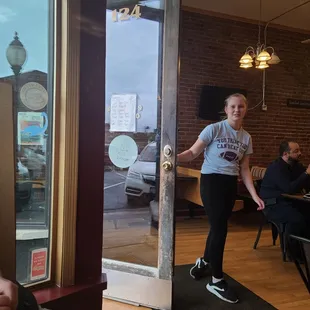 The sweet girl holding the door..thank you