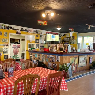 a restaurant with a checkered table cloth