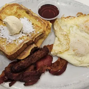 Excellent French Toast. It&apos;s nice thick cut bread heavily soaked in egg. Great bacon too. Sausage is average.