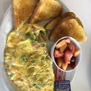 Western omelette with sourdough (we&apos;ll done) and fruit instead of hash browns.