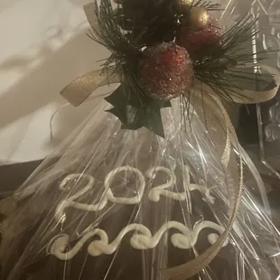 a chocolate cake wrapped in plastic
