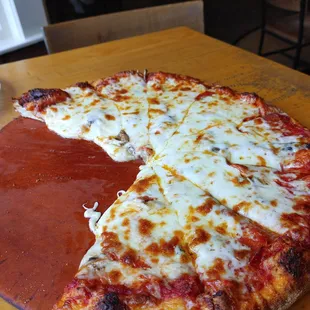 Large pizza with pepperoni, mushroom and xtra, xtra cheese!