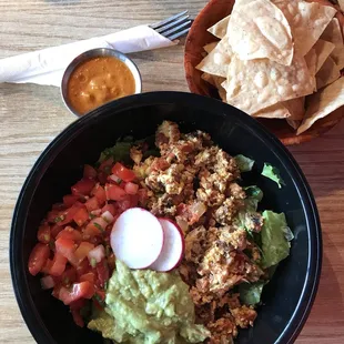 Naked breakfast burrito with eggs steak pico guacamole over lettuce