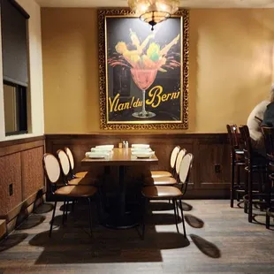 a dining room with tables and chairs