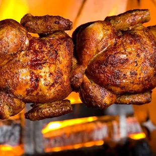 Open flame rottiserie chickens in San Bernardino