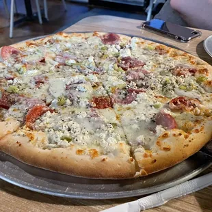 Sicilian, one of their gourmet pizzas with olive oil base