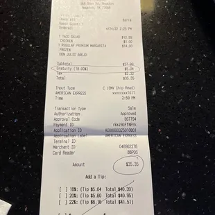 Receipt. Note: gratuity is added to the total and suggested tip is based on the total (including gratuity and tax).