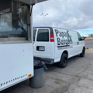 a delivery truck parked in a parking lot