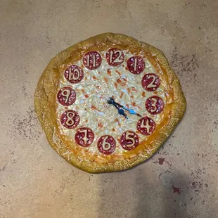 a pizza with pepperoni on it