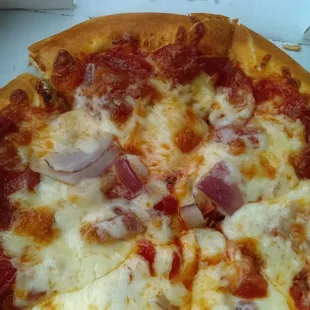 Personal-sized pepperoni and onion.