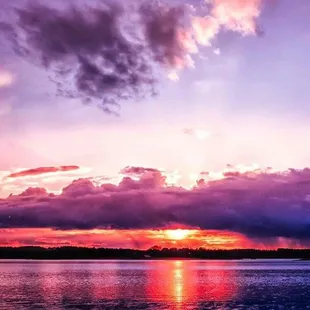 a sunset over the water