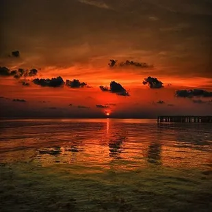 a sunset over the ocean